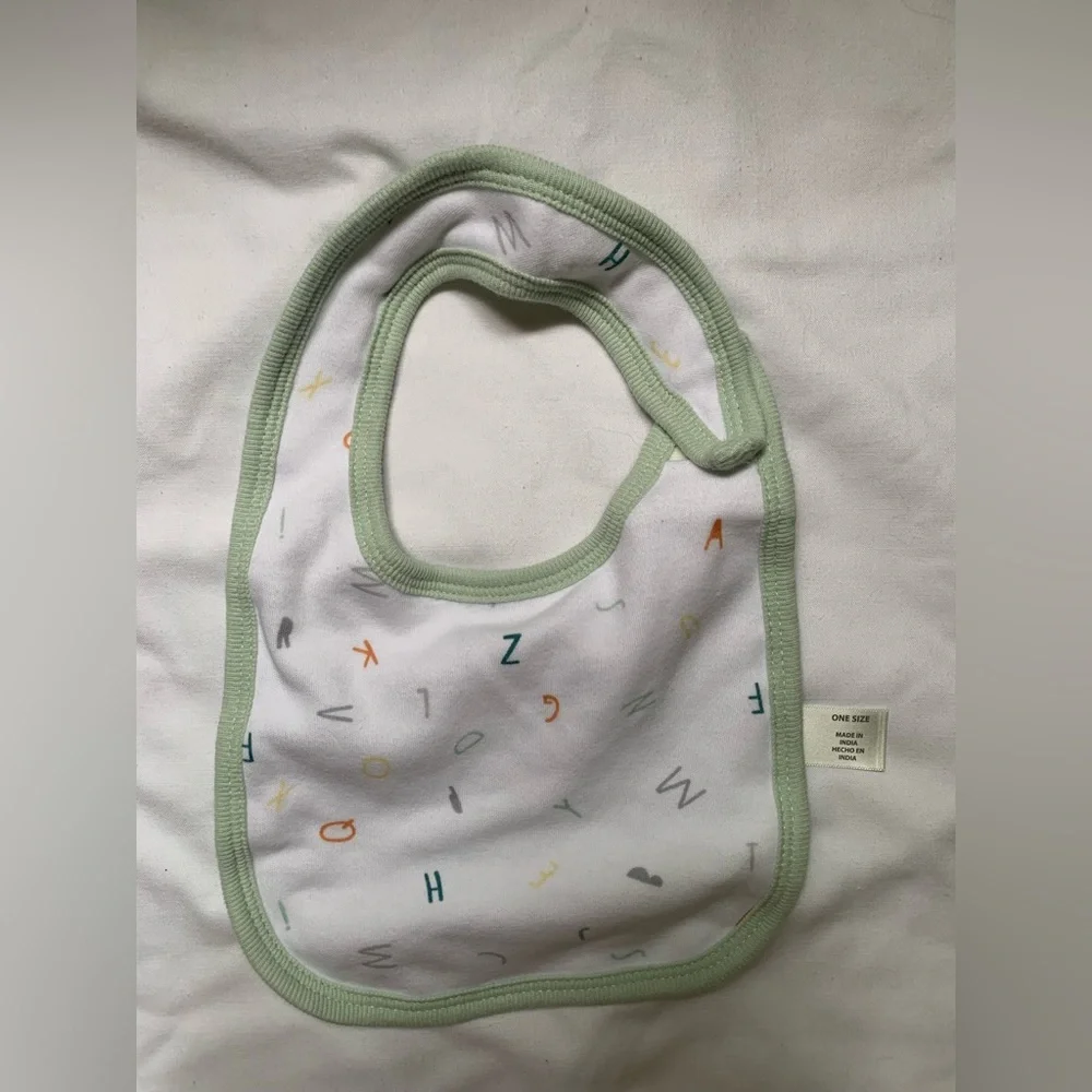 Cloud Island bibs - set of 4. Green and yellow.
